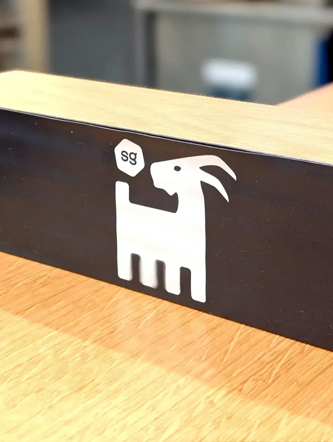 Sweetgreen goat graphic on a restaurant counter